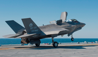 Illustration for article titled USS America: The Navy's Newest Flattop Can't Decide What The Hell It Is